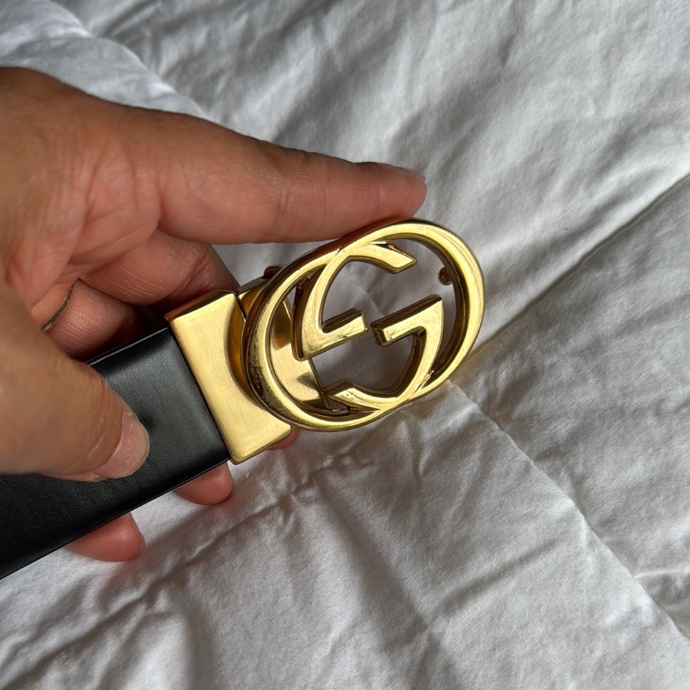 Gucci Black and Gold Leather Belt with Iconic GG Buckle